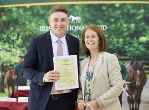 Jarrod Robinson receiving his Irish National Stud graduation certificate.
